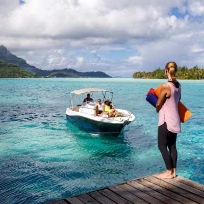 A couple going to a yoga session in Bora Bora