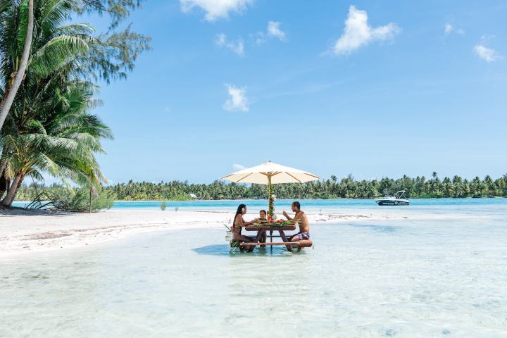 A family having water lunch on a private island in Bora Bora