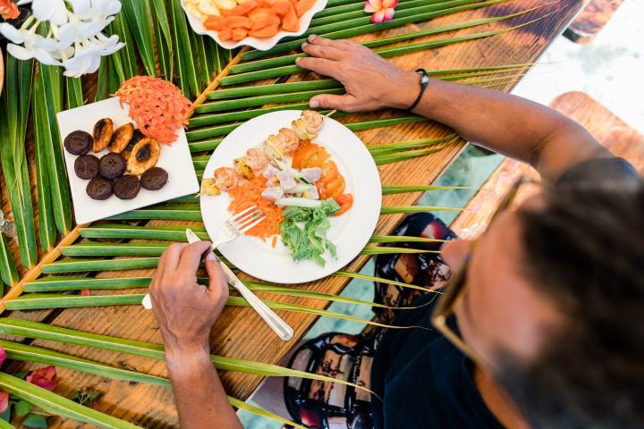 A man having water lunch in Bora Bora